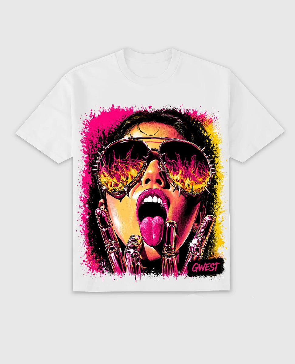 A white short-sleeve t-shirt featuring a vibrant graphic print of a woman with sunglasses, pink hair, and a tongue sticking out, shown alongside a matching Air Jordan 3 sneaker and a 'GUEST' sticker on a light gray background.