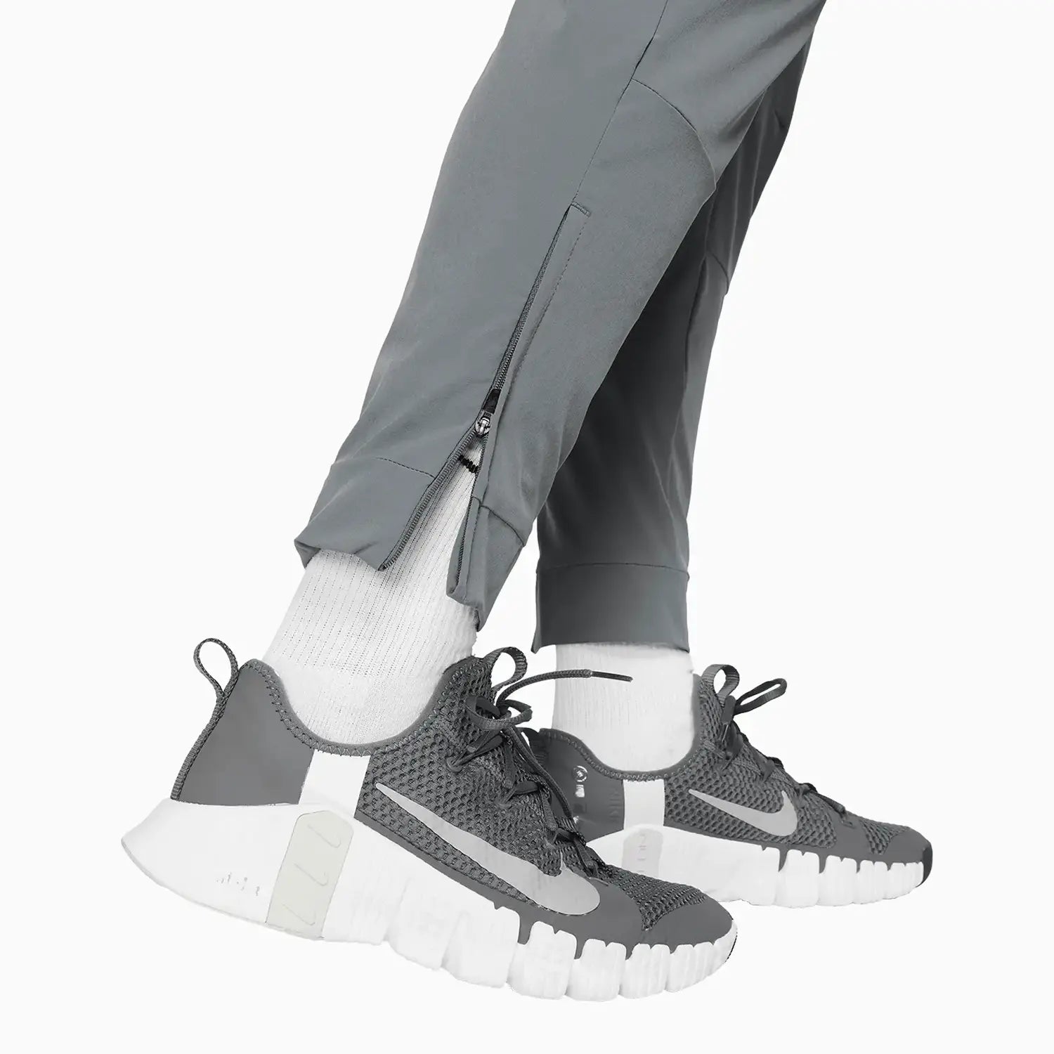 Men's Unlimited Dri - Fit Zippered Cuff Sweat Pant Nike - Tops and Bottoms USA