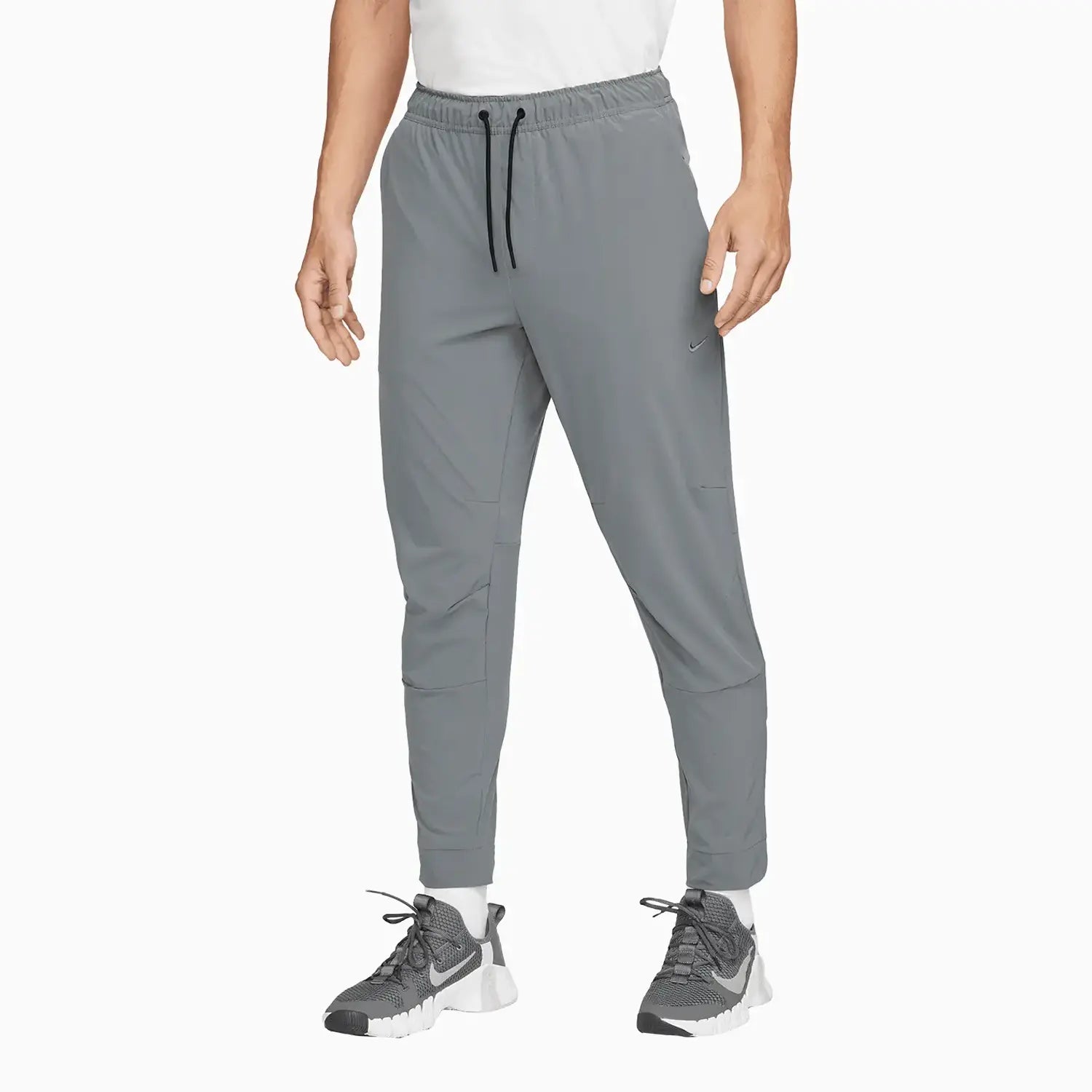 Men's Unlimited Dri - Fit Zippered Cuff Sweat Pant Nike - Tops and Bottoms USA