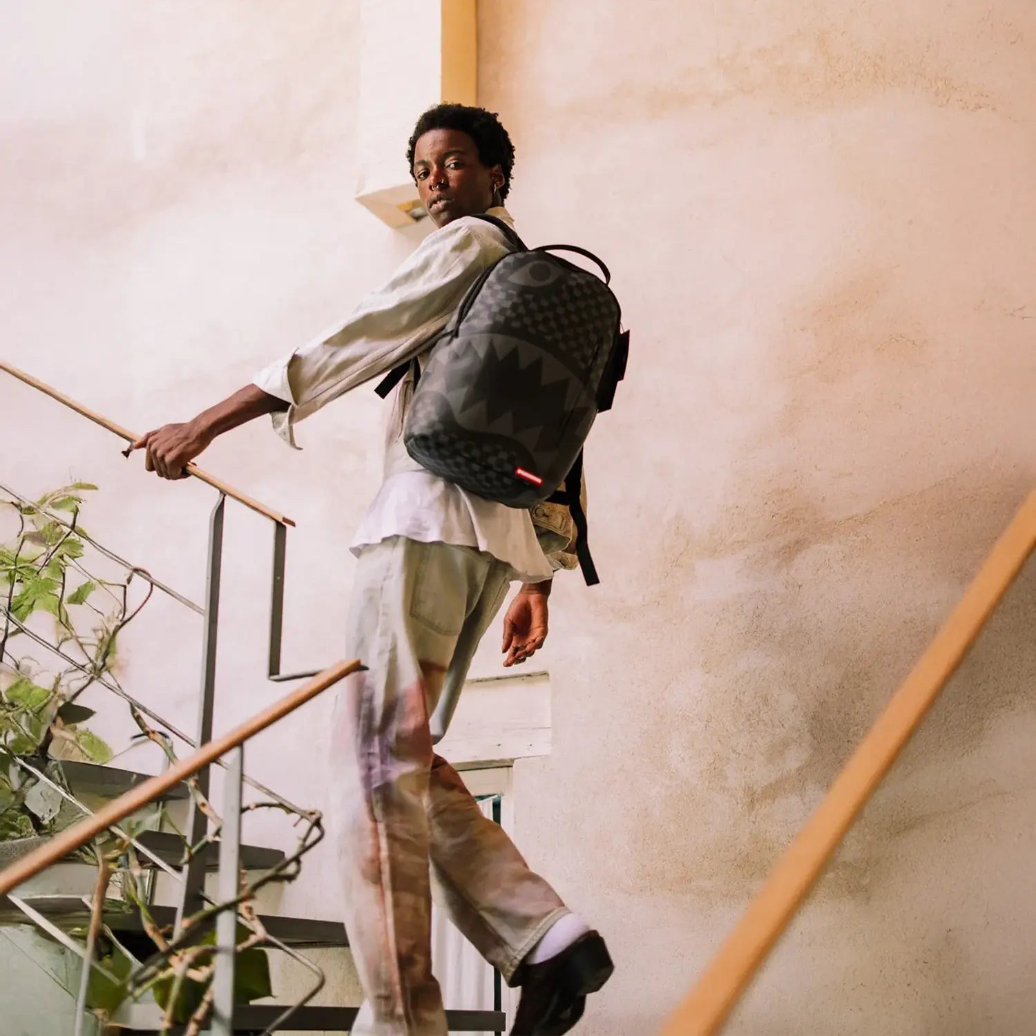 sprayground-hangover-drip-check-backpack-b6777