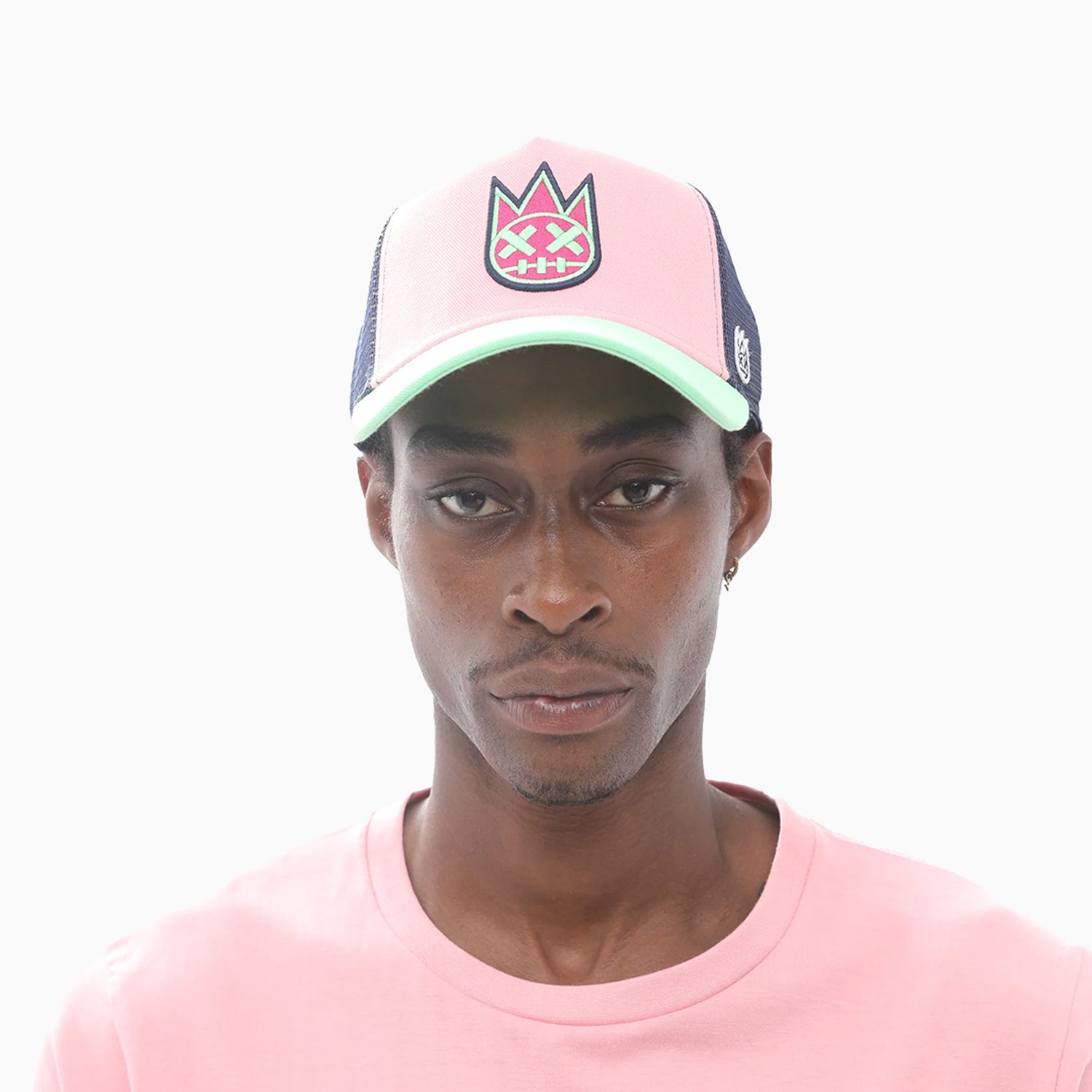 cult-of-individuality-mens-clean-logo-mesh-back-trucker-curved-visor-in-candy-pink-623ac-ch80a