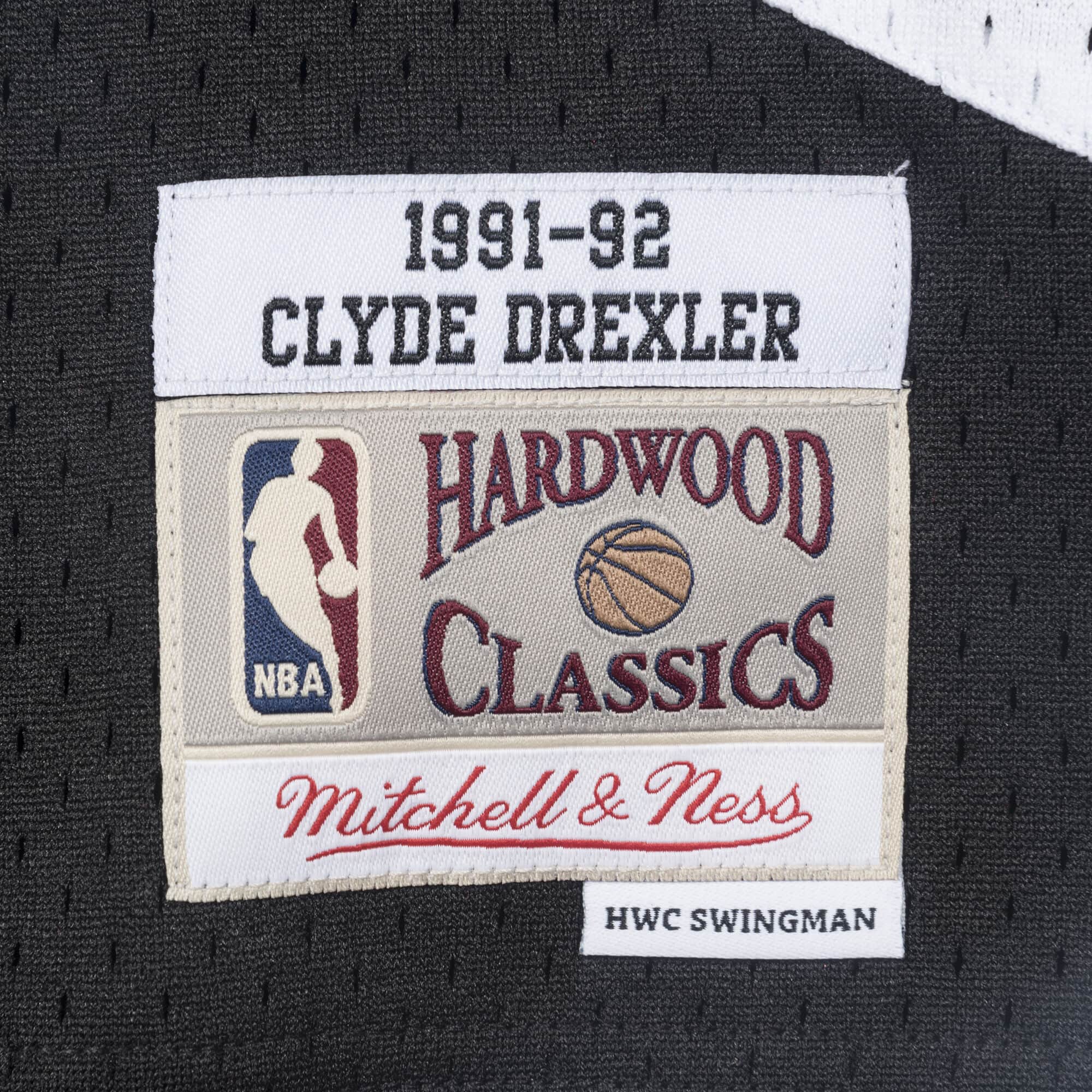 mitchell-and-ness-swingman-clyde-drexler-portland-trail-blazers-nba-1991-92-jersey-smjygs18204-ptbblck91cdr