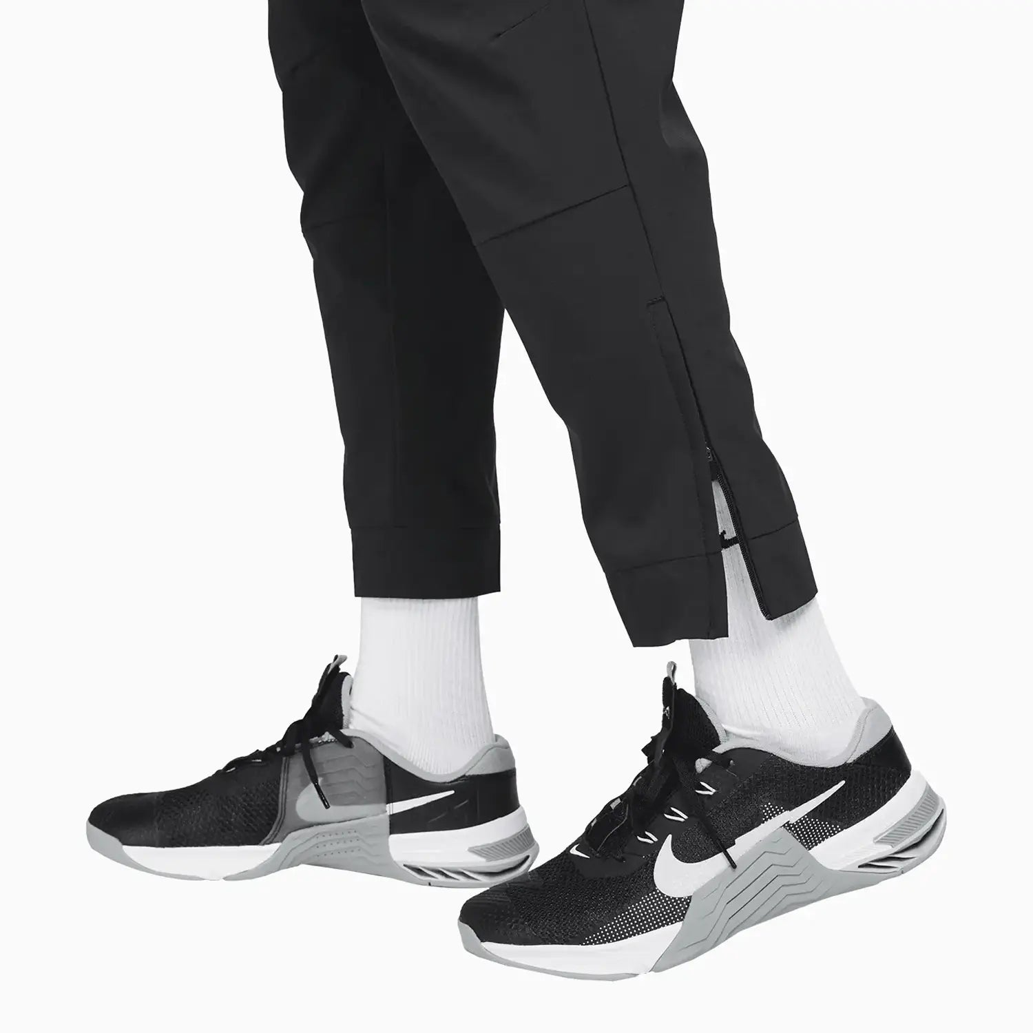 Men's Unlimited Dri - Fit Zippered Cuff Sweat Pant Nike - Tops and Bottoms USA