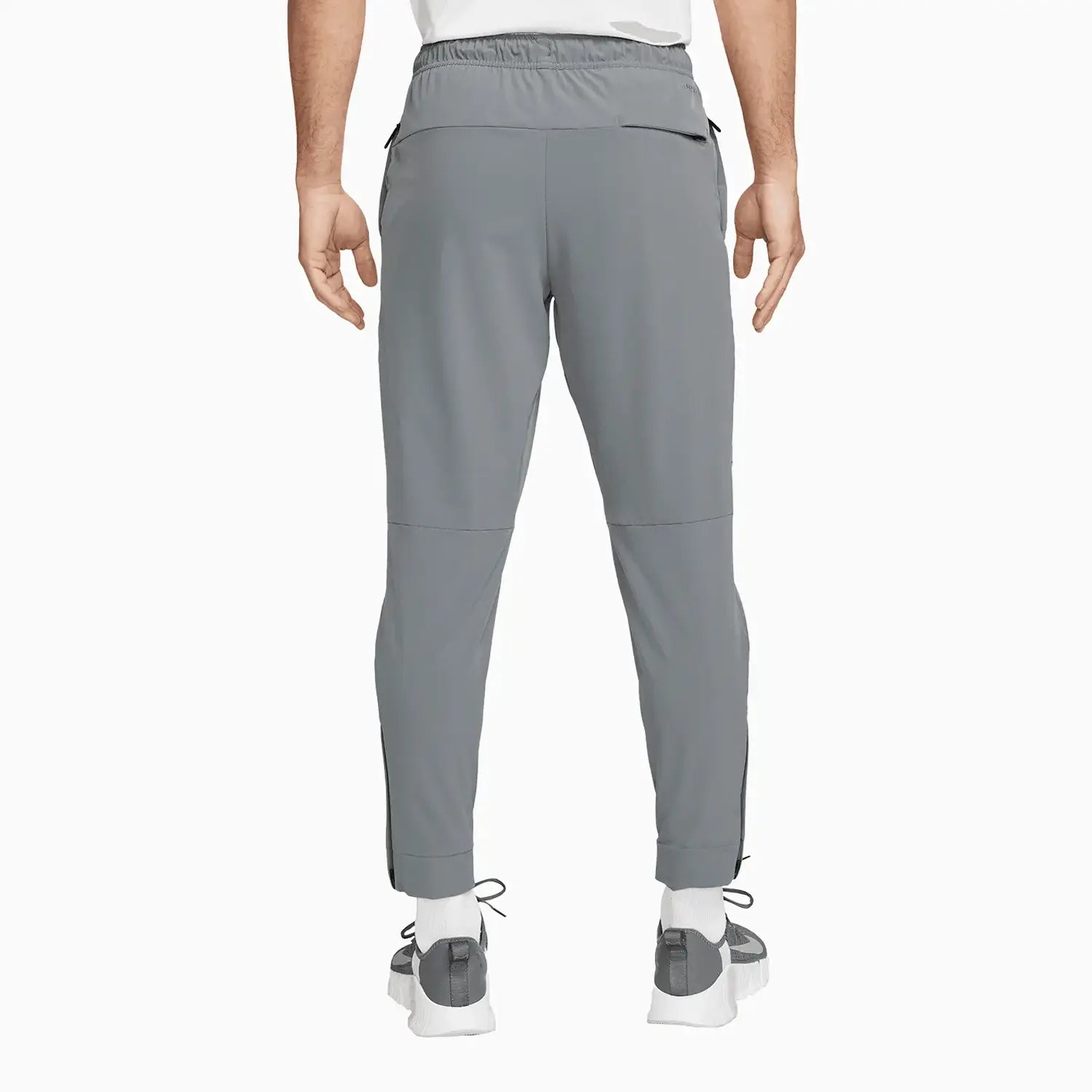 Men's Unlimited Dri - Fit Zippered Cuff Sweat Pant Nike - Tops and Bottoms USA