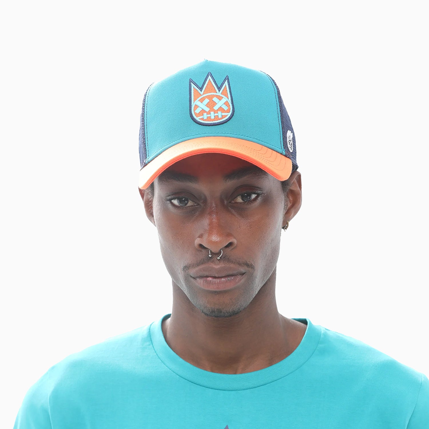 cult-of-individuality-mens-clean-logo-mesh-back-trucker-curved-visor-in-tile-blue-623ac-ch72a
